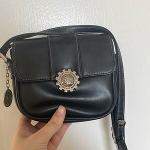 Black crossbody purse with silver hardware